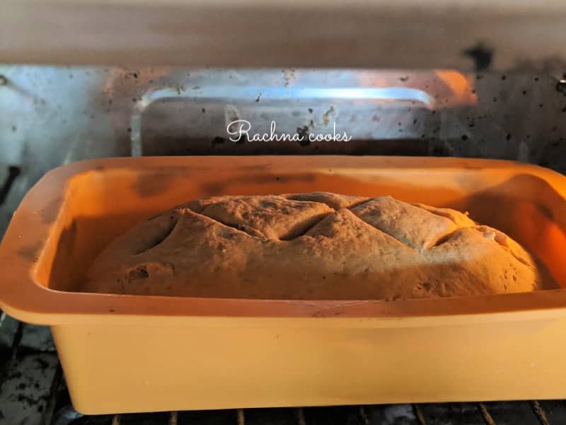 baking whole wheat bread loaf in oven.