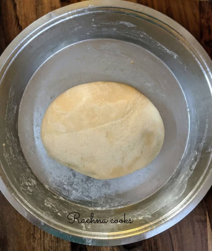 Dough doubled in a shallow plate.