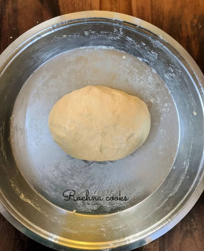 Kneaded bread dough in a shallow plate