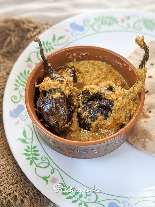Two small aubergines served with curry in a small bowl