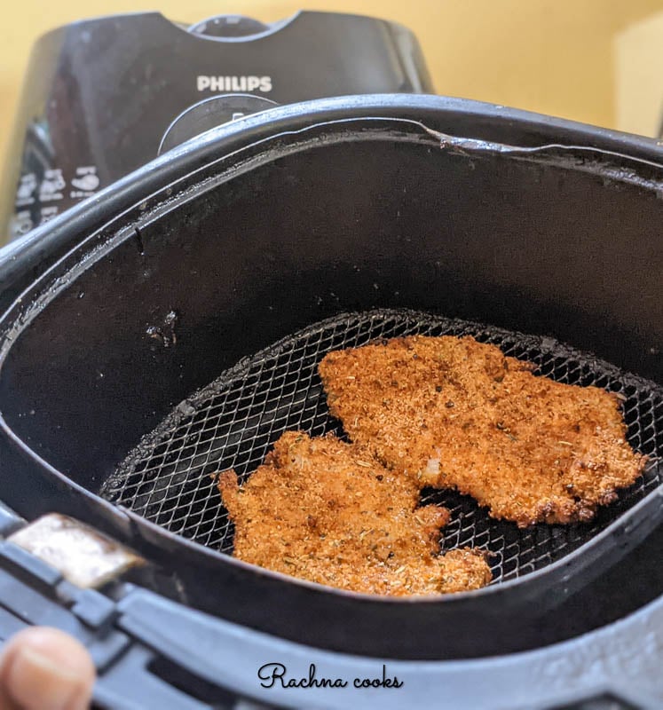 air fried breaded fish in air fryer basket