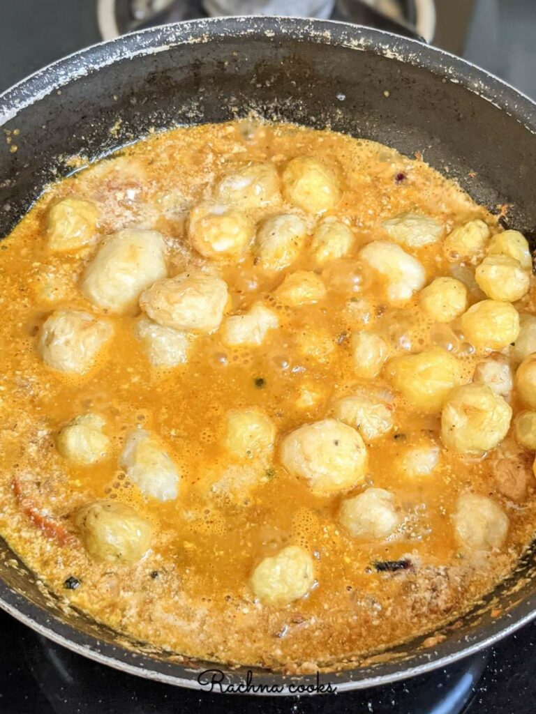 Simmering dum aloo curry