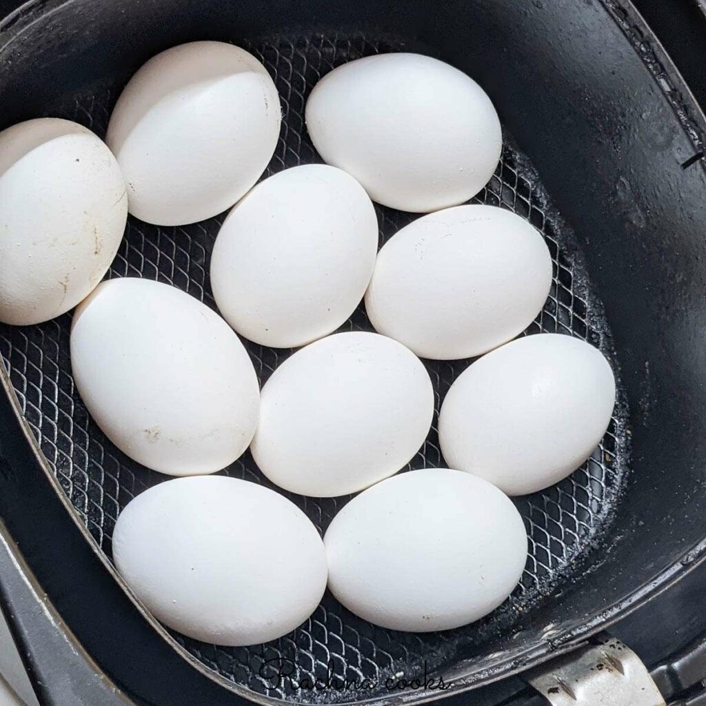 Eggs after air frying in the air fryer basket.