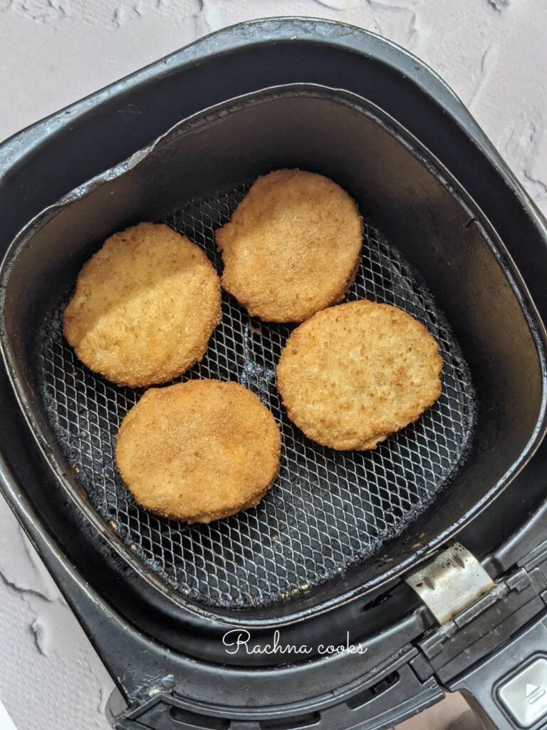 Brown crispy chicken patties cooked from frozen in air fryer basket