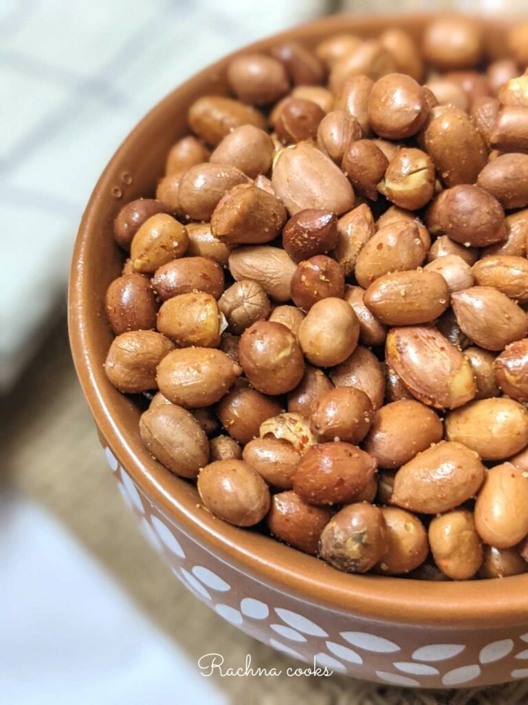 Close up of a bowl of spicy air fried roasted peanuts.