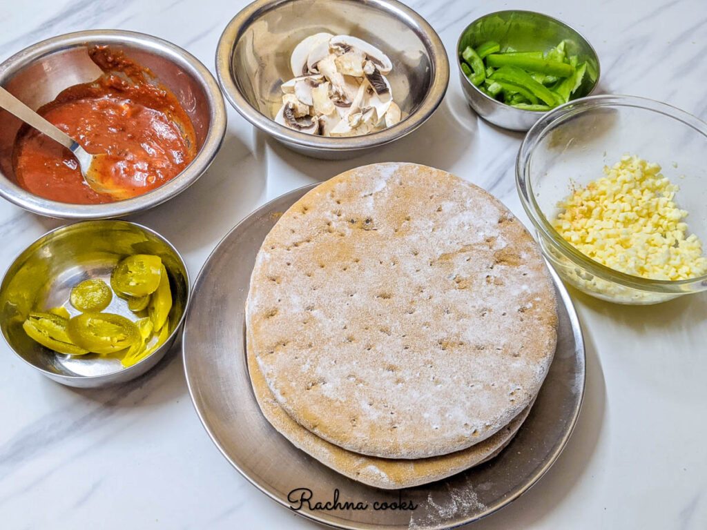 Ingredients laid out to make homemade pizza