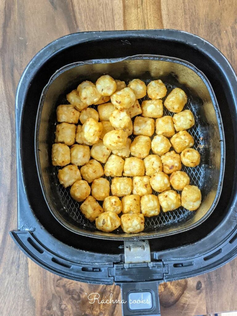 Golden tater tots after air frying.