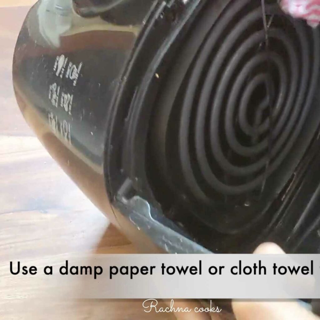 Clean coil with damp towel