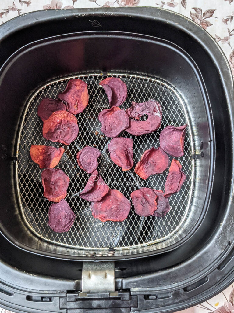 beetroot chips after air frying in air fryer basket