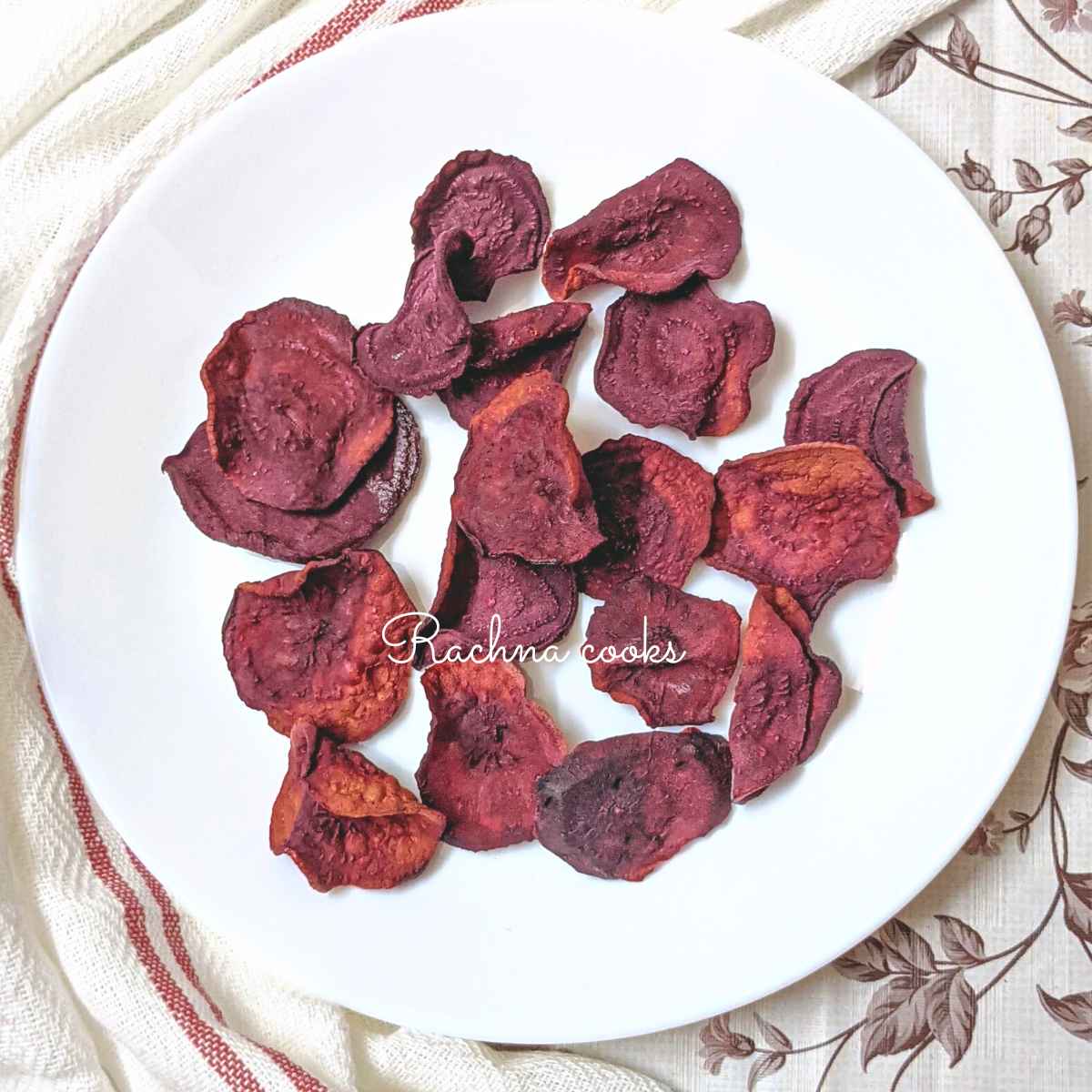 Air fryer beet chips on a white plate