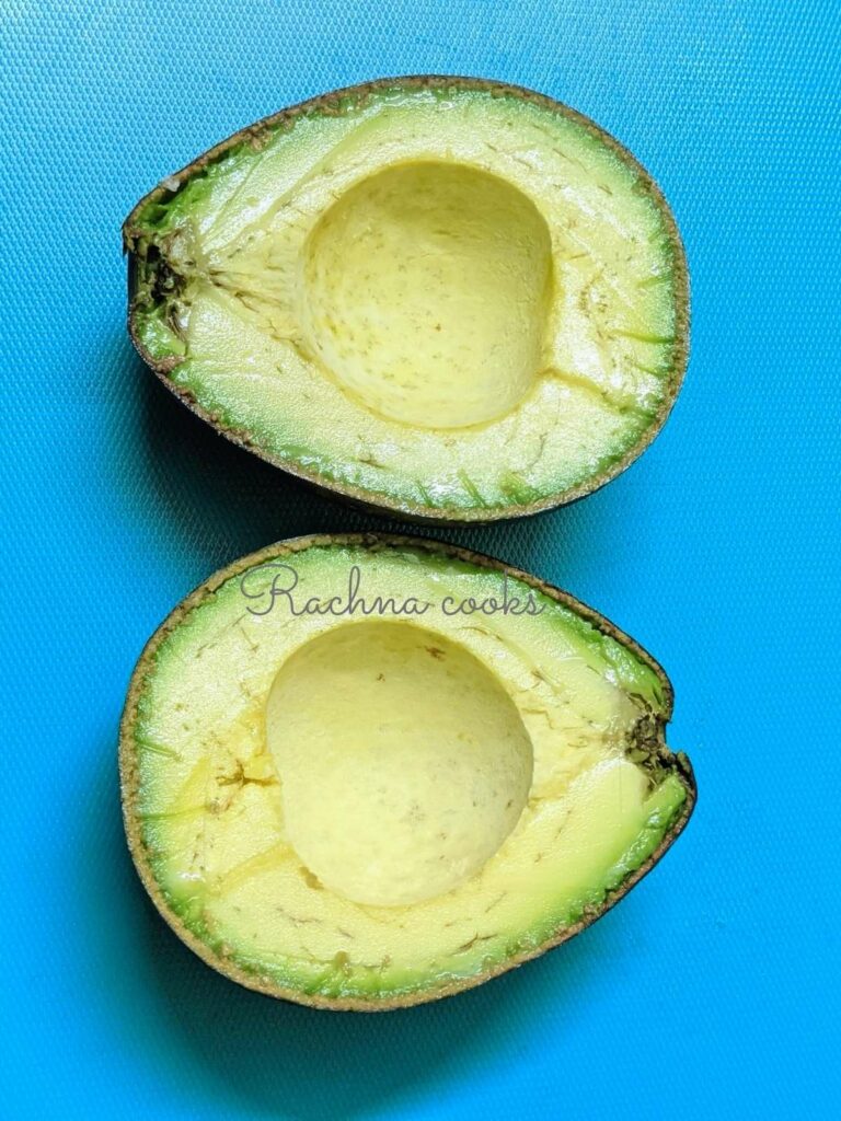 Avocado cut in half with seed removed