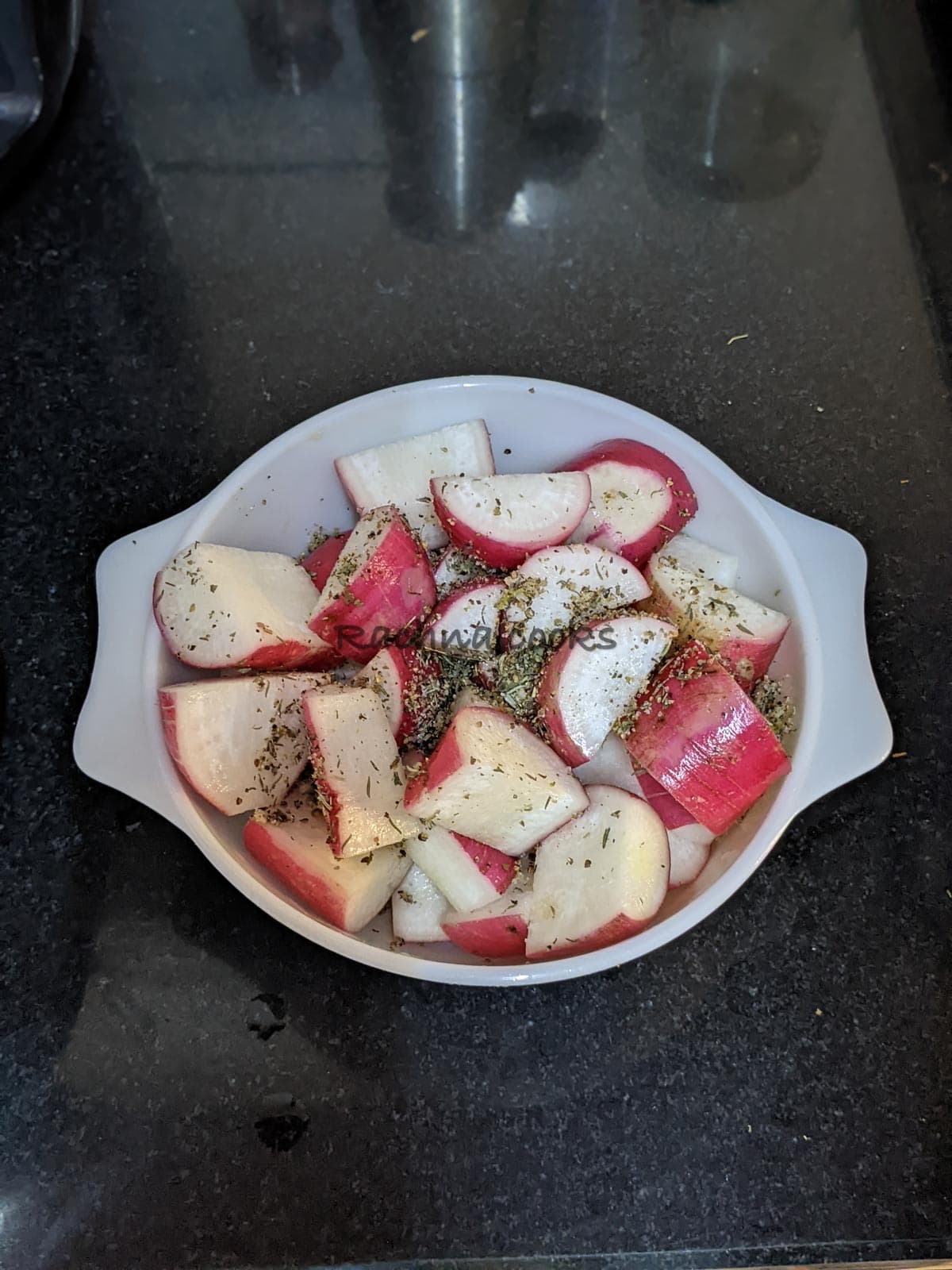 Radishes cut in halves or quarters marinated in oil and spices