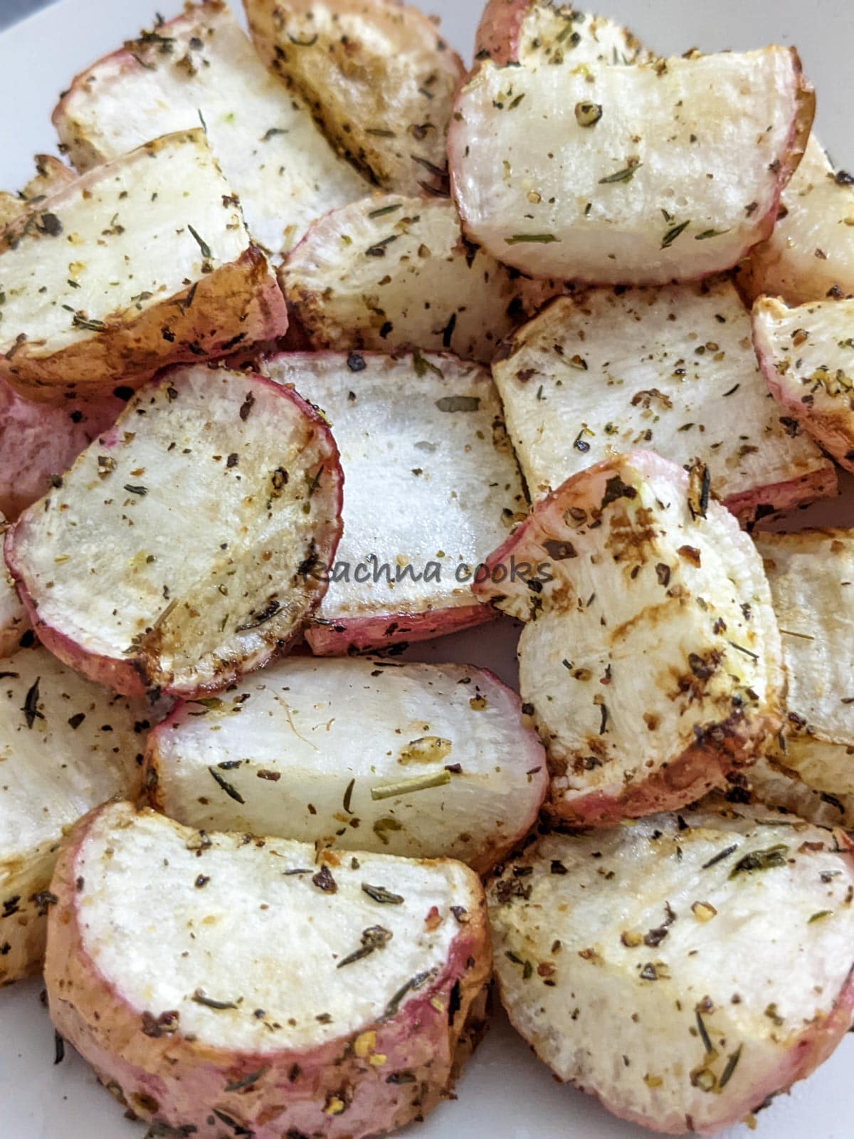Delicious air fried roasted radishes in closeup with crispy outside and soft cooked inside. 