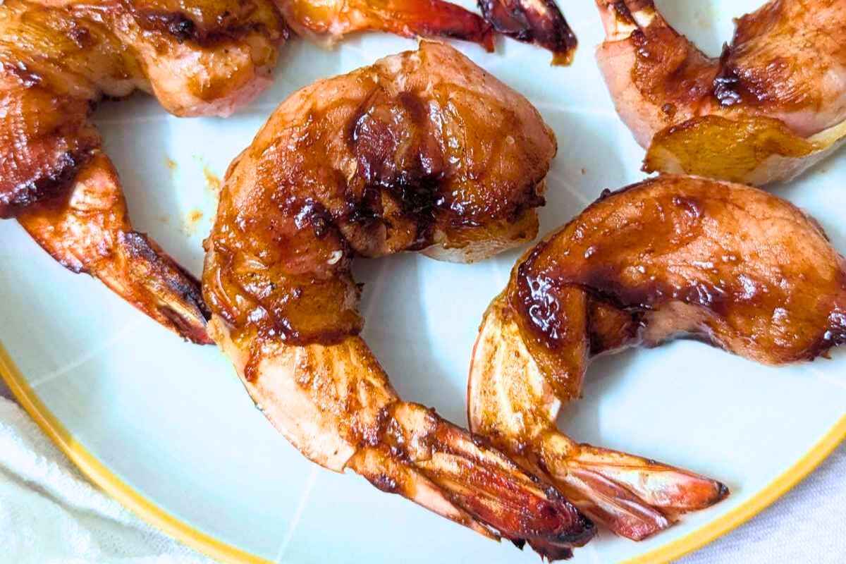 Bacon wrapped shrimp on a plate