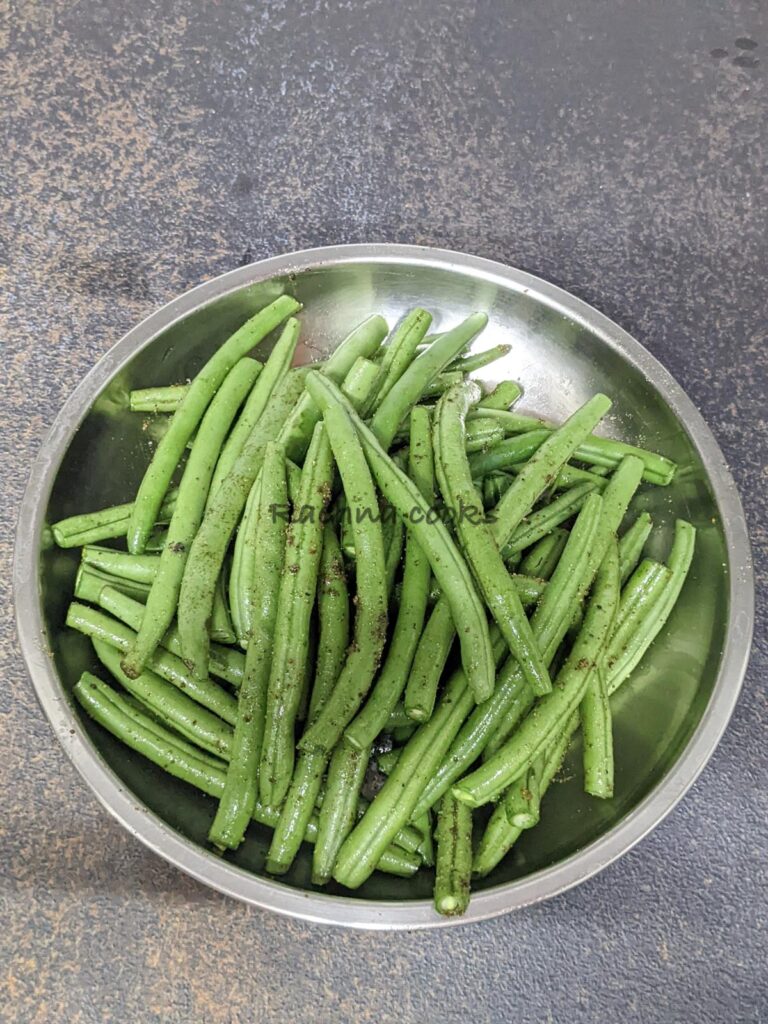 Green beans tossed with olive oil and seasonings.