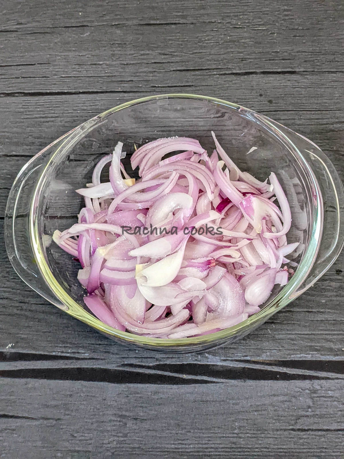 Sliced onion tossed with salt and oil.