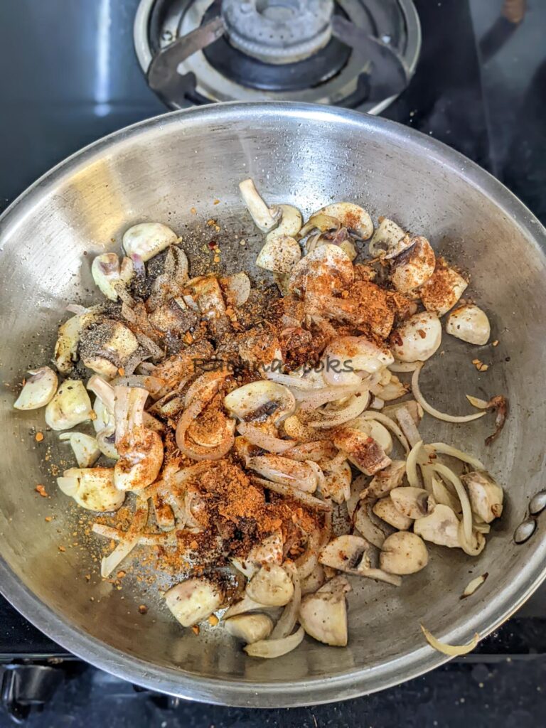 Spices added to sauteeing onions and mushrooms