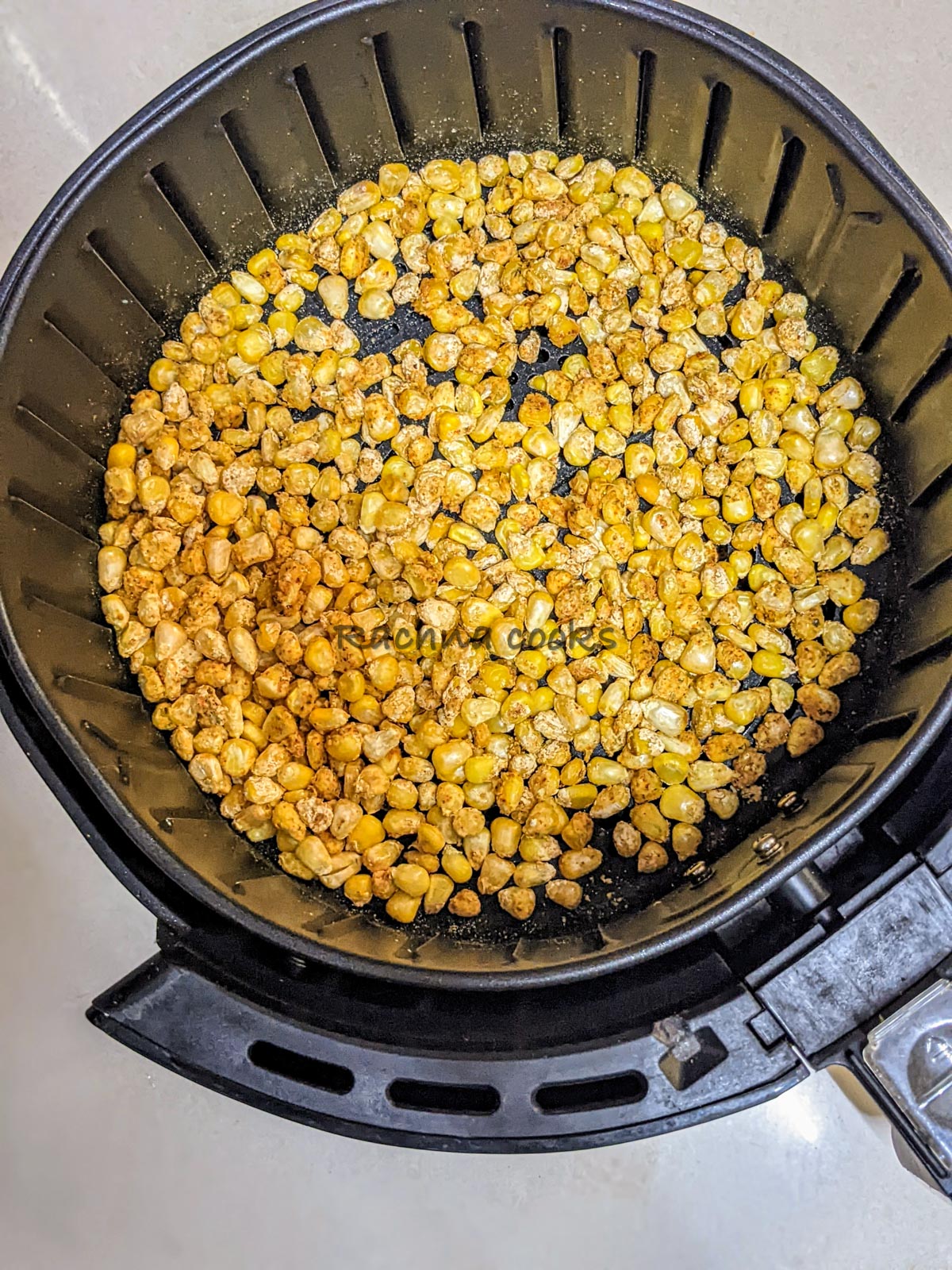 Corn kernels in air fryer with spices
