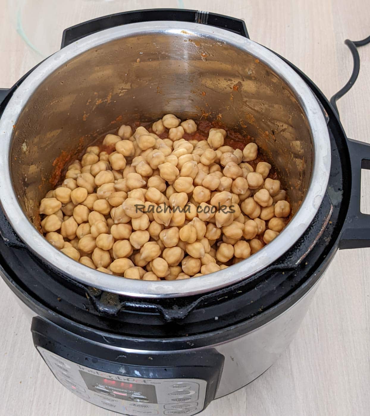 Soaked and drained chole or chickpeas added to the masala base.