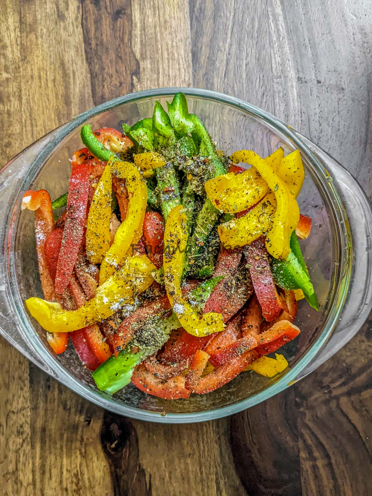 Peppers with sprinkled spices and oil