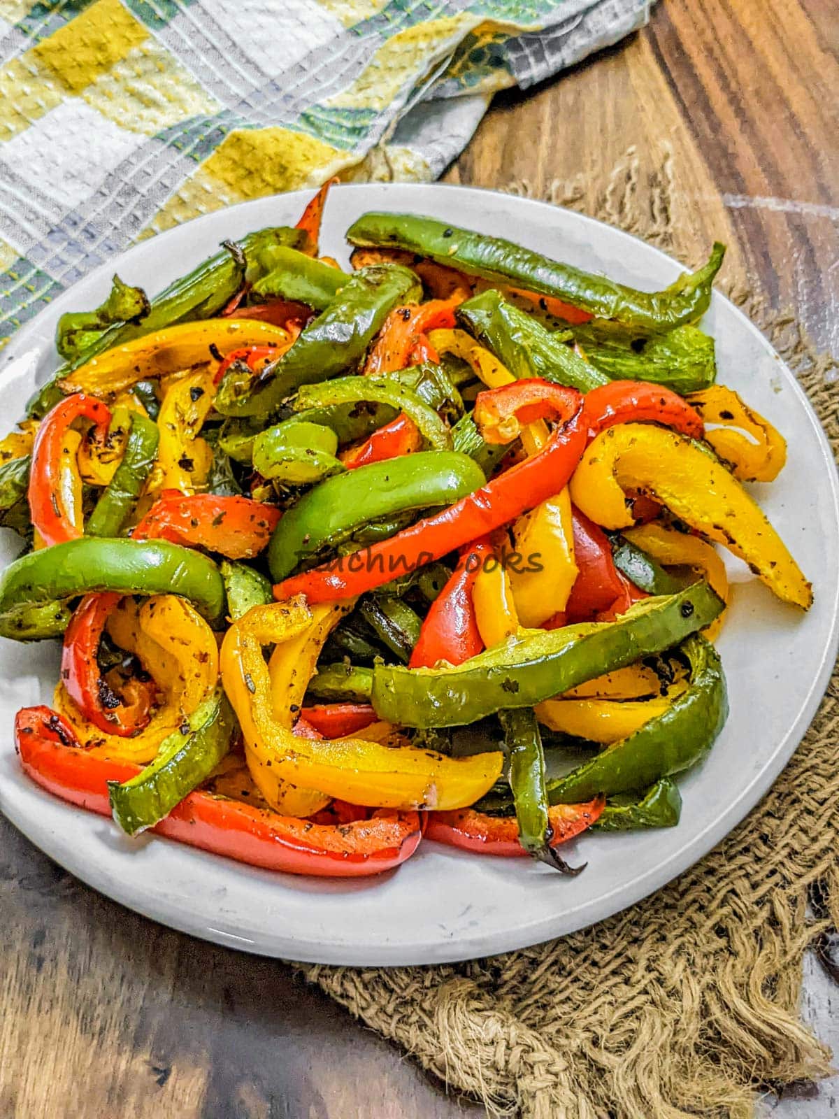 Air fried peppers on a white plate