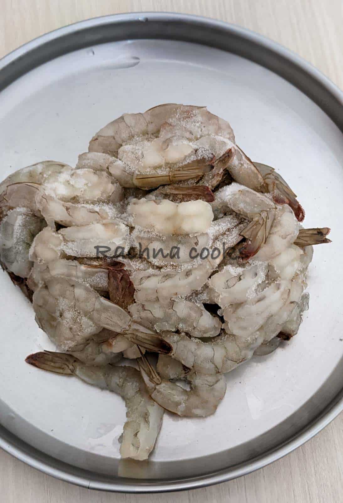 Frozen raw shrimp on a plate
