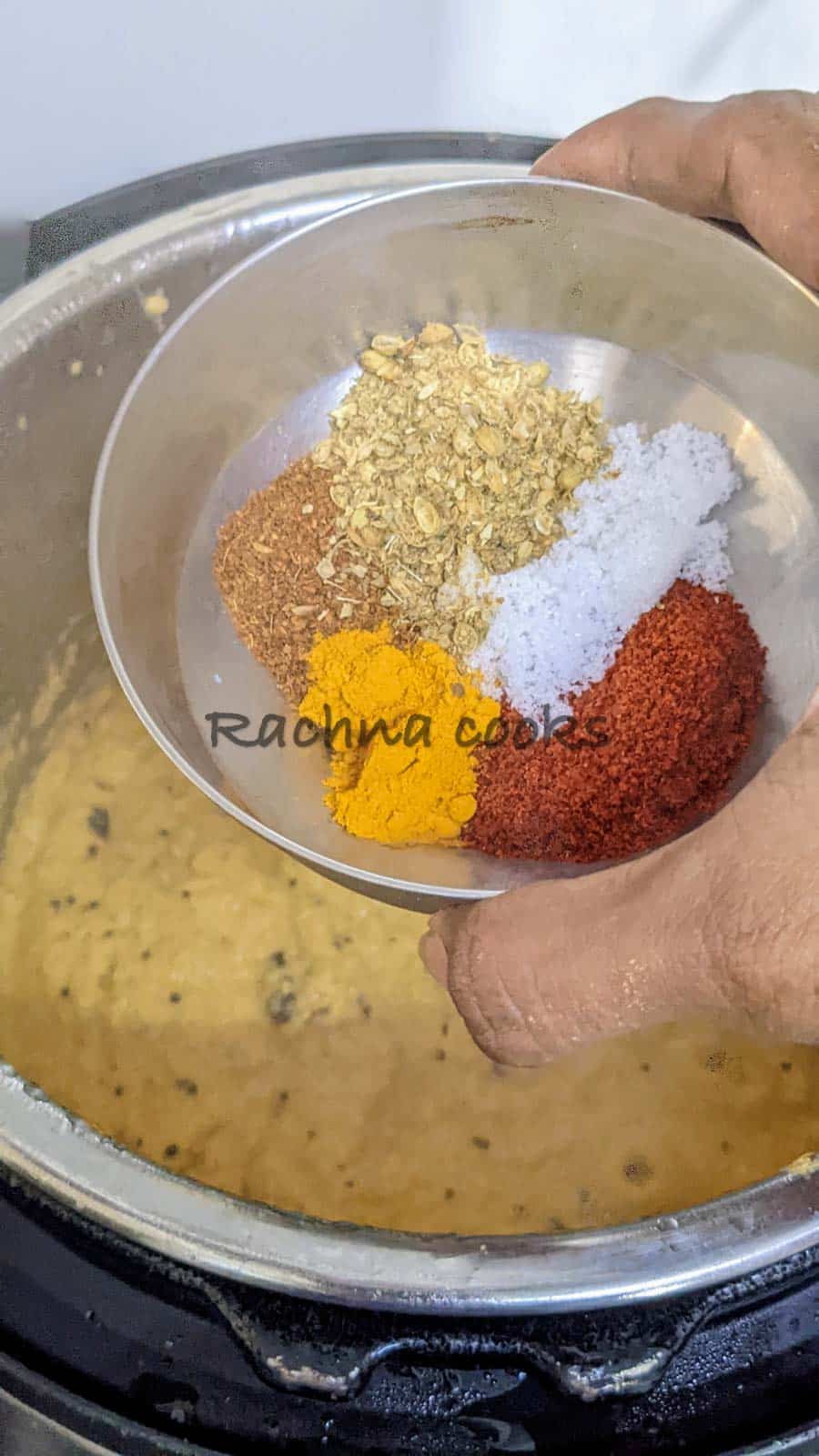 Spices in a bowl to be added to the curry base in Instant Pot.