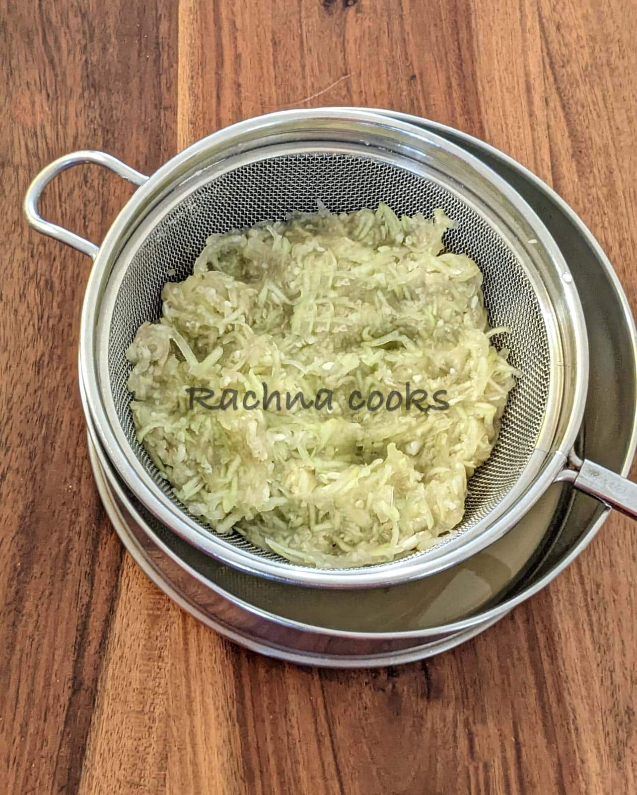 grated lauki with water squeezed out.