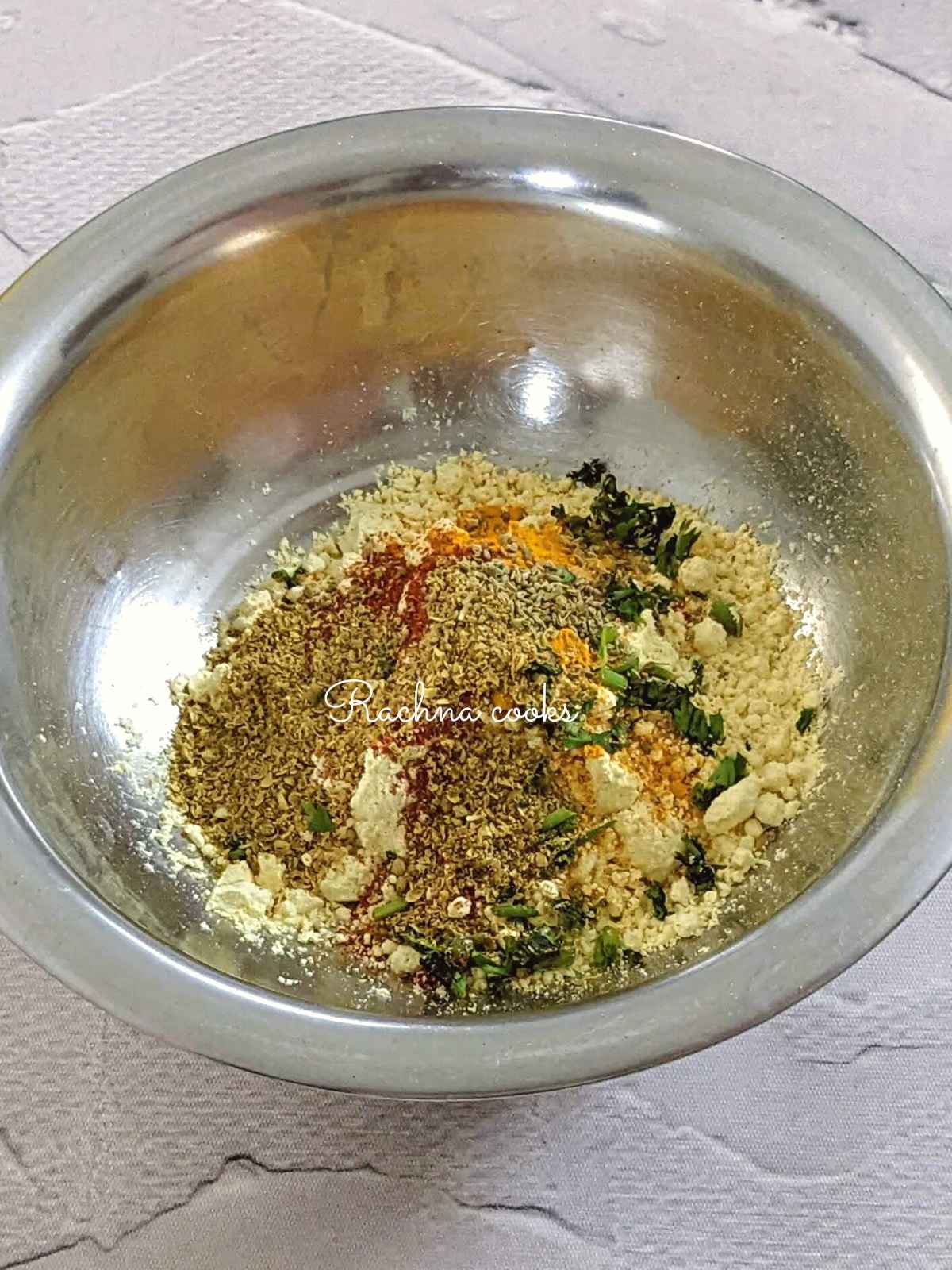 Chickpea flour with spices, salt and coriander leaves.