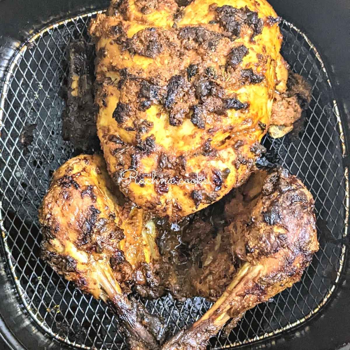 Whole chicken being cooked in air fryer