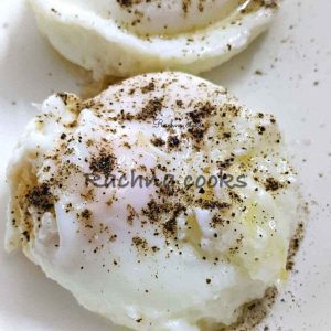 Two poached eggs on a plate