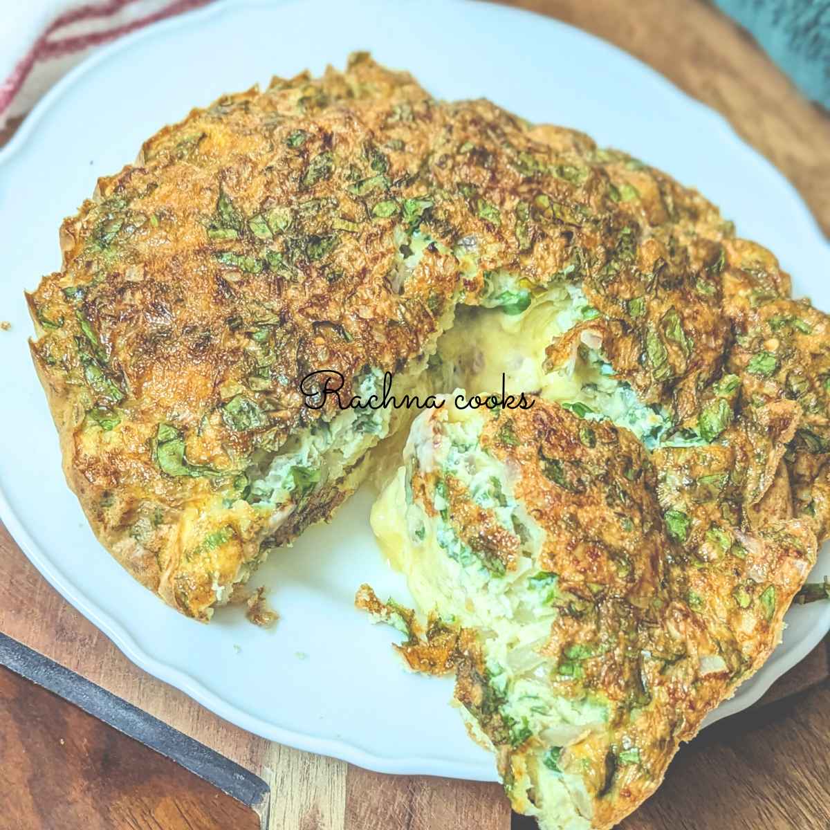 Frittata with one slice taken out.