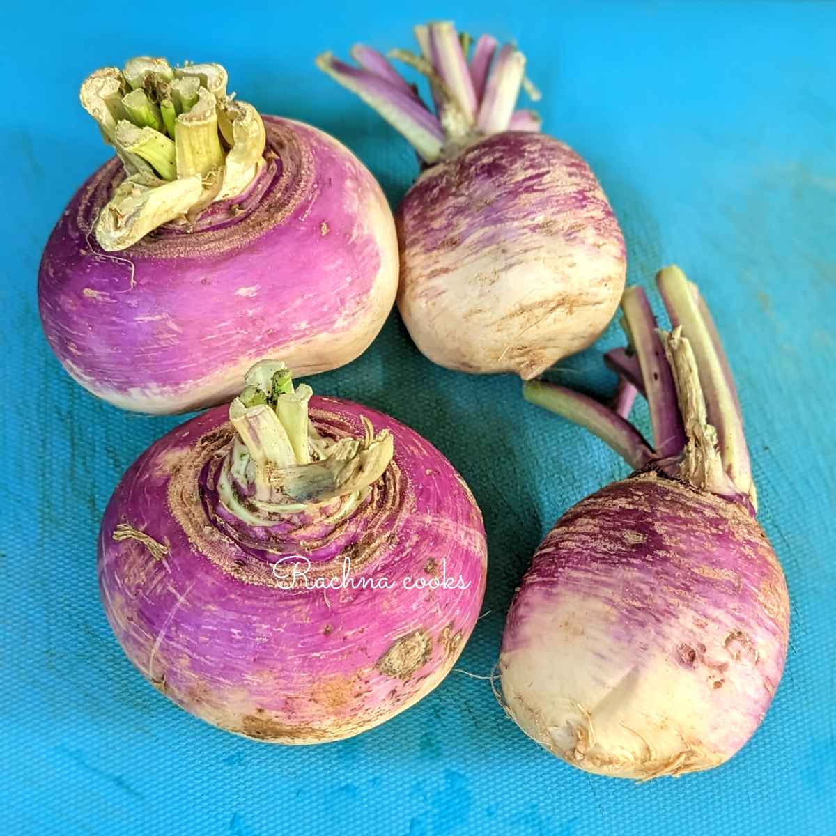 4 turnips on a chopping sheet