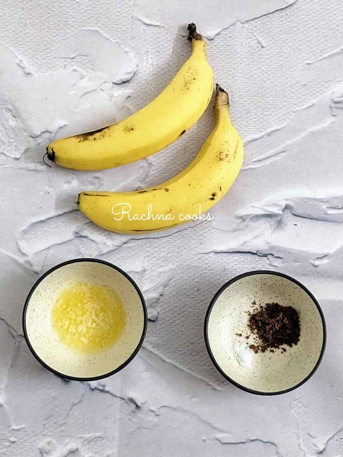 2 bananas, butter in a bowl and brown sugar with cinnamon in another bowl.