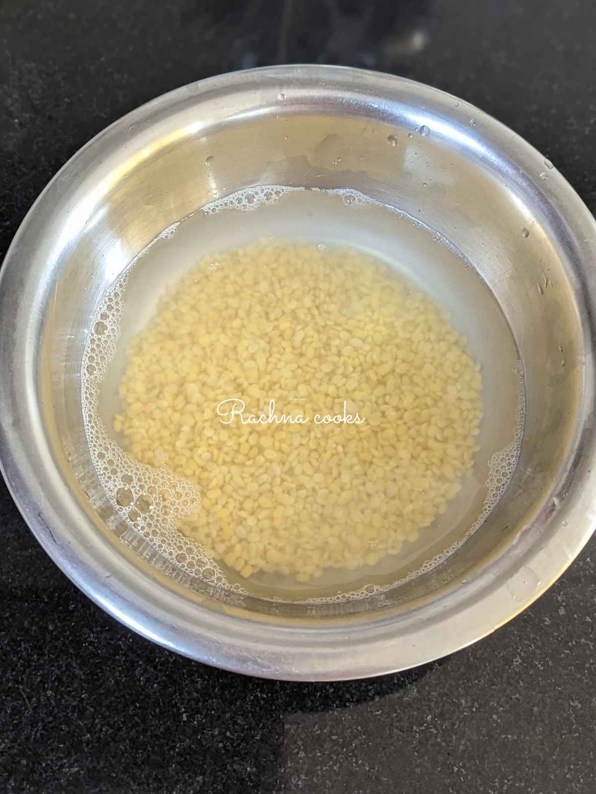 Moong dal soaked in water.