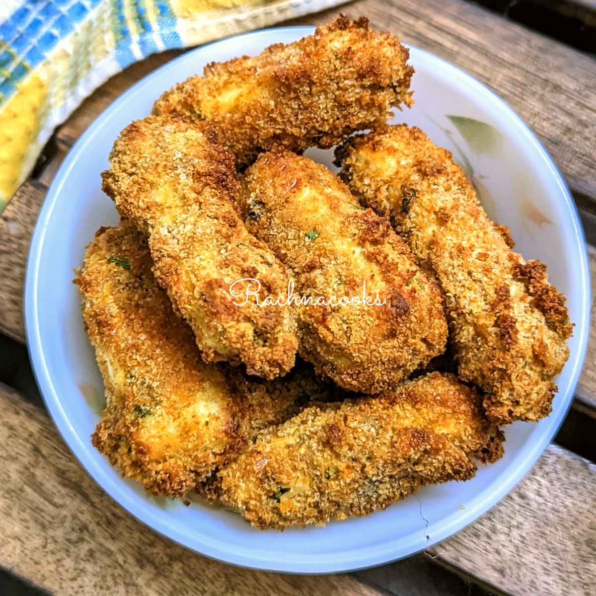 air fried paneer fingers in a white bowl