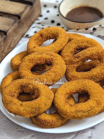 Frozen onion rings on a white plate