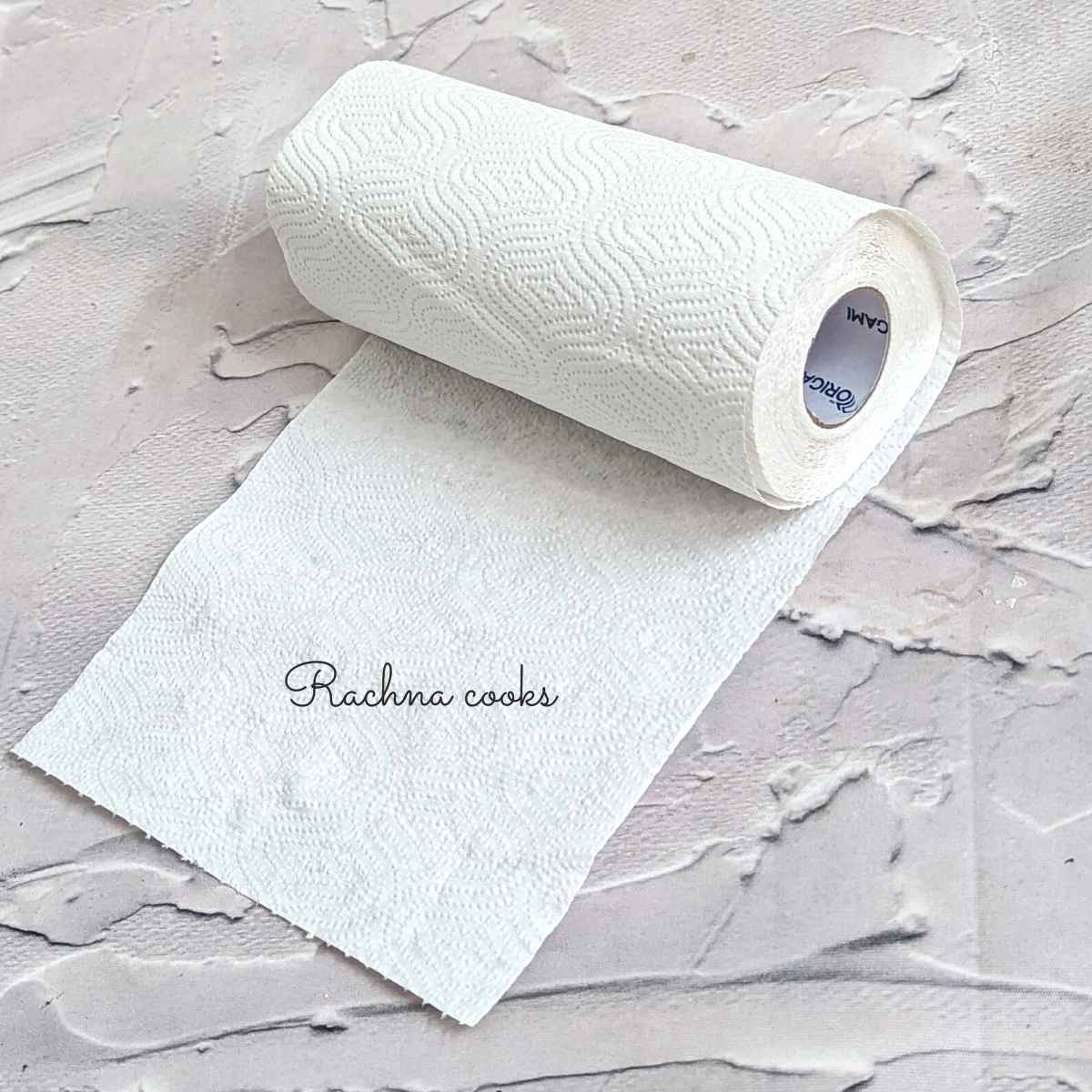 A paper towel roll on a surface