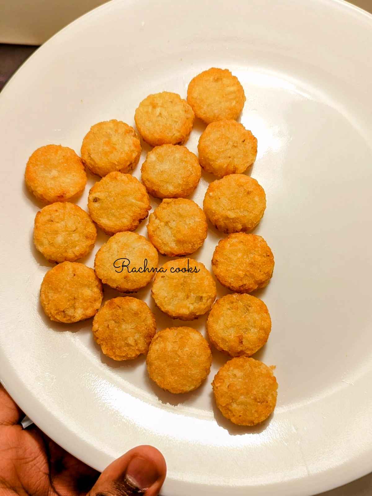 Ore Ida crispy crowns served after air frying on a white plate.
