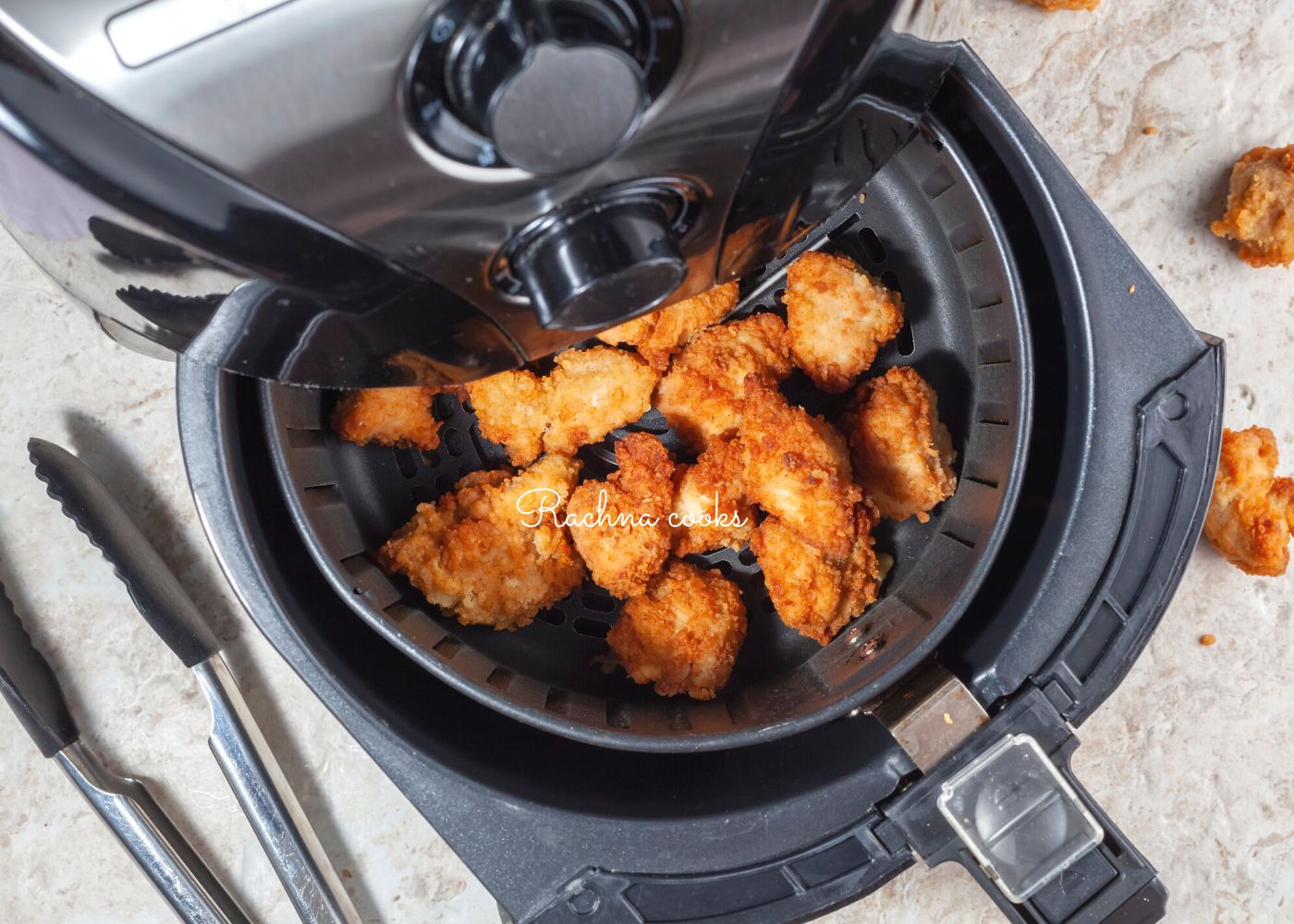 Chicken nuggets being reheated in an air fryer