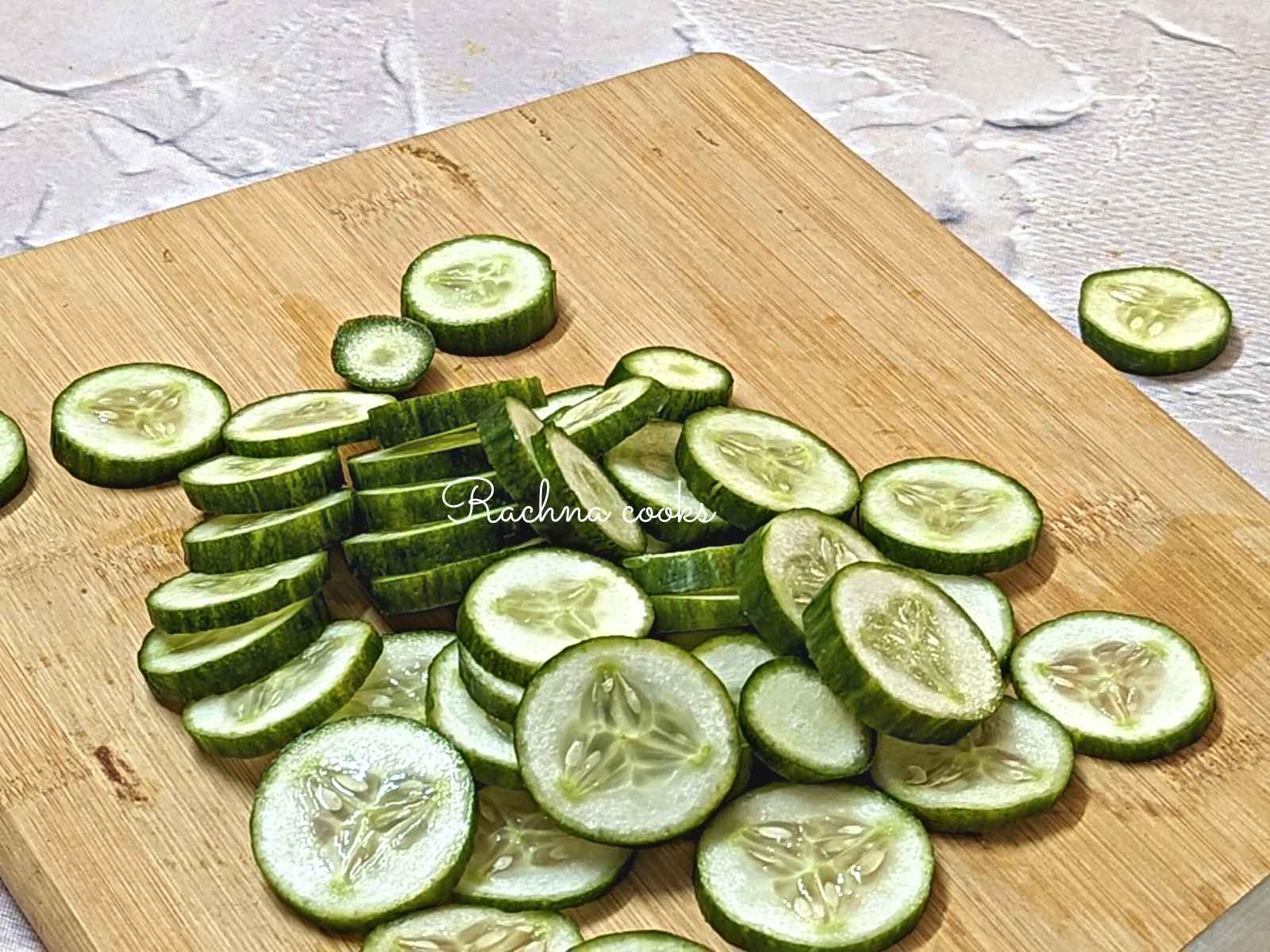 Sliced cucumbers on a chopping board
