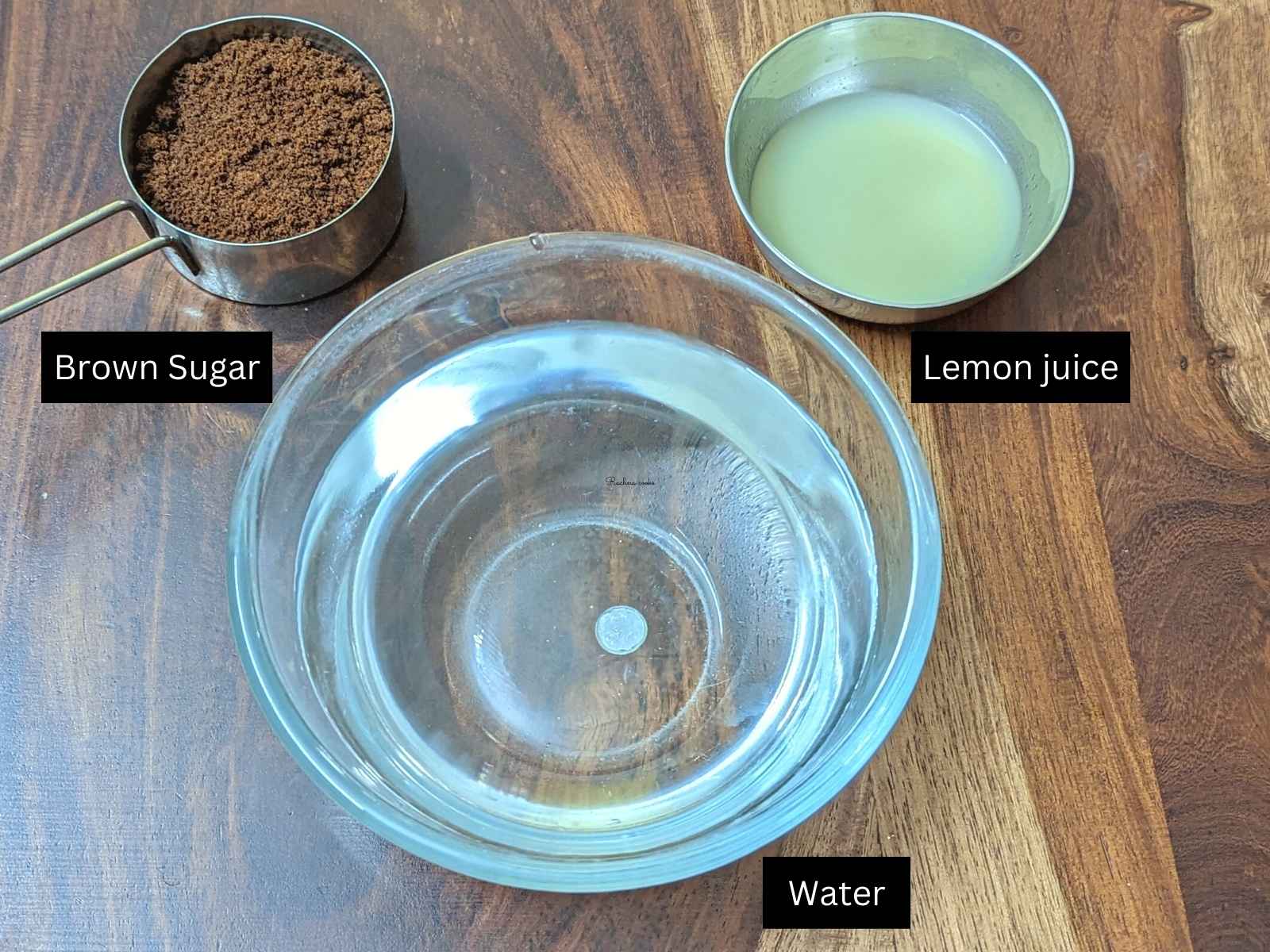 Ingredients for lemonade: brown sugar, lemon juice and water