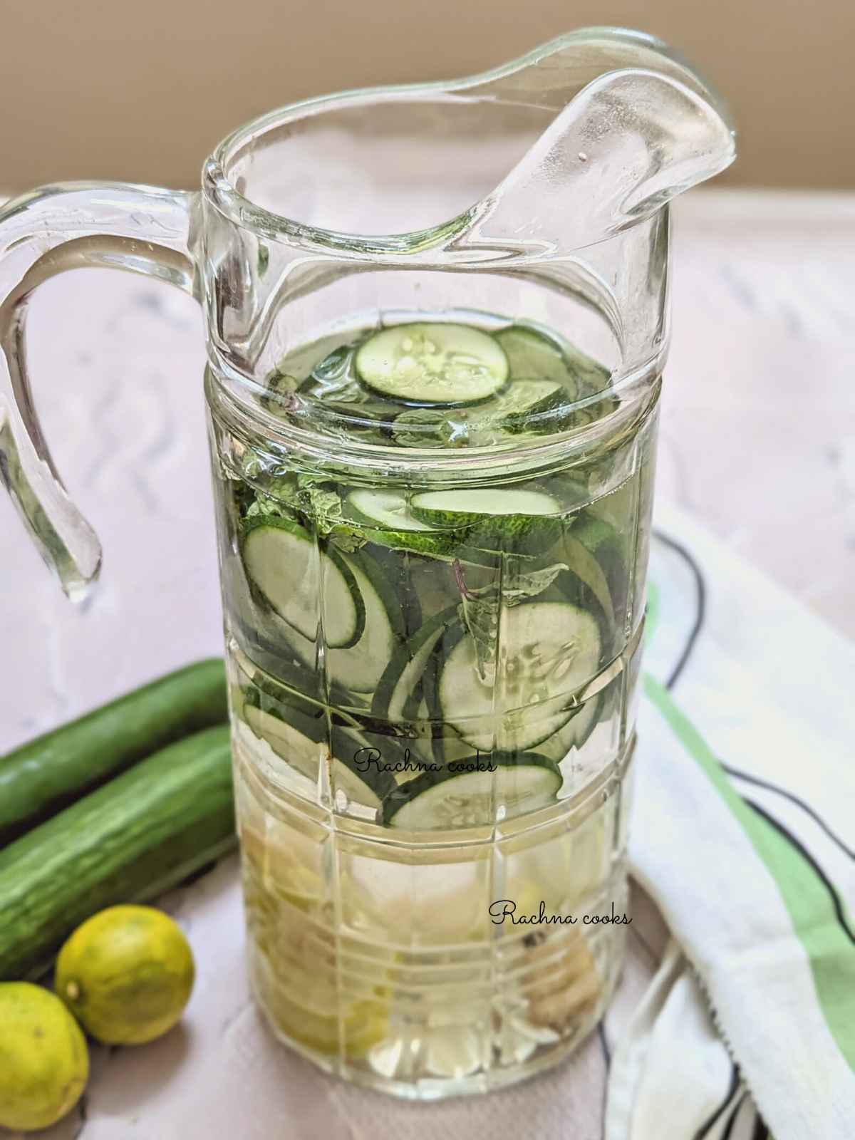 A jug of cucumber lemon ginger water