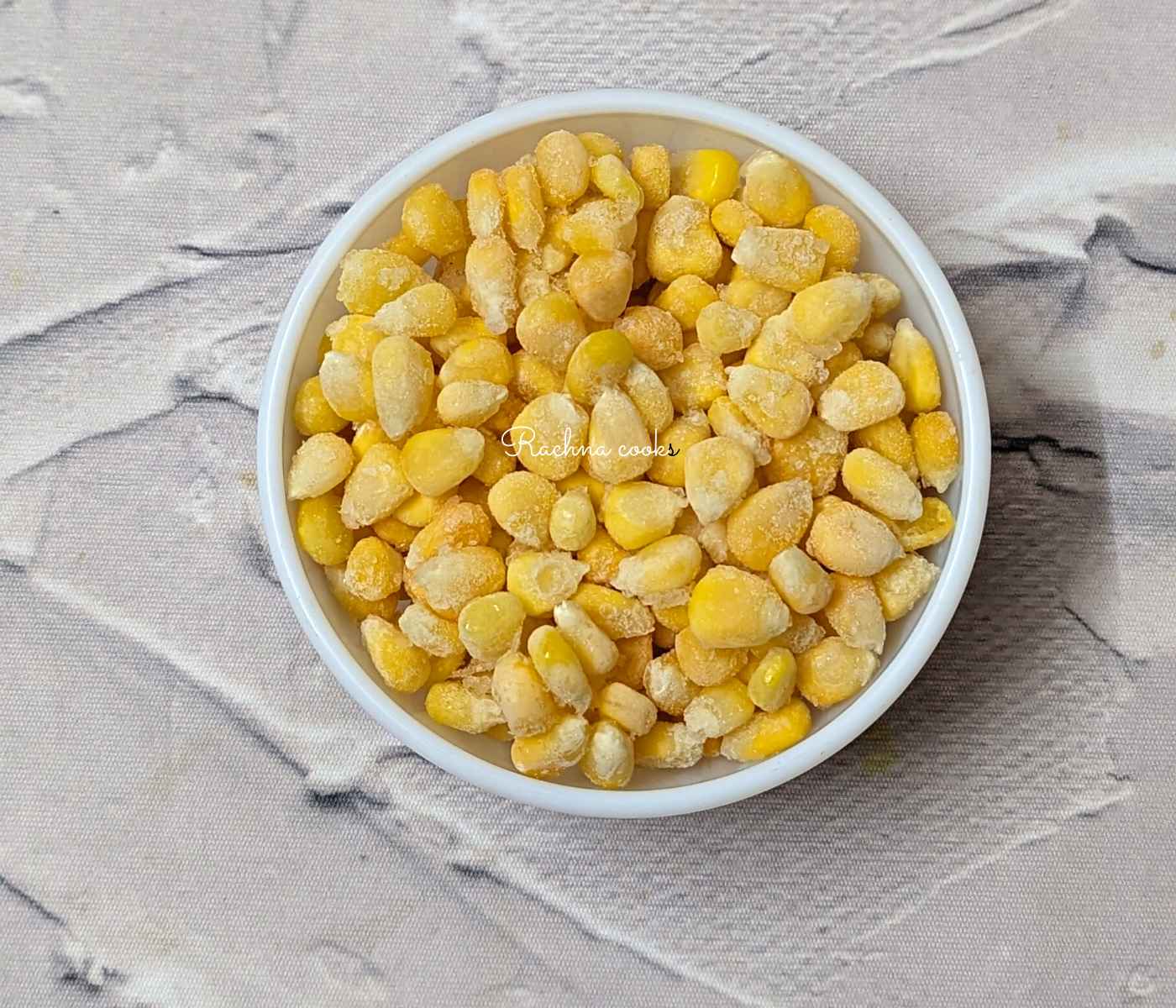A bowl of frozen corn