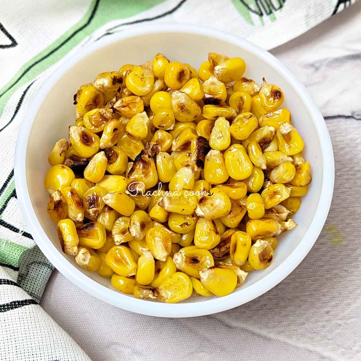 A bowl of skillet charred corn.