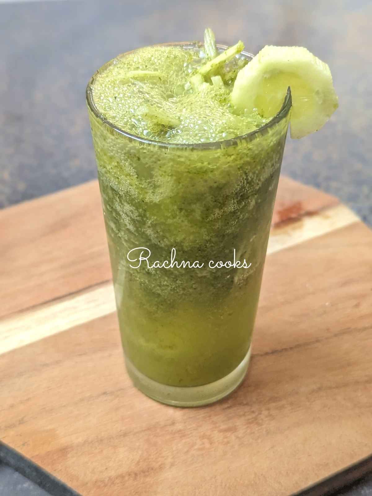 A glass of fizzy cucumber mint lemonade