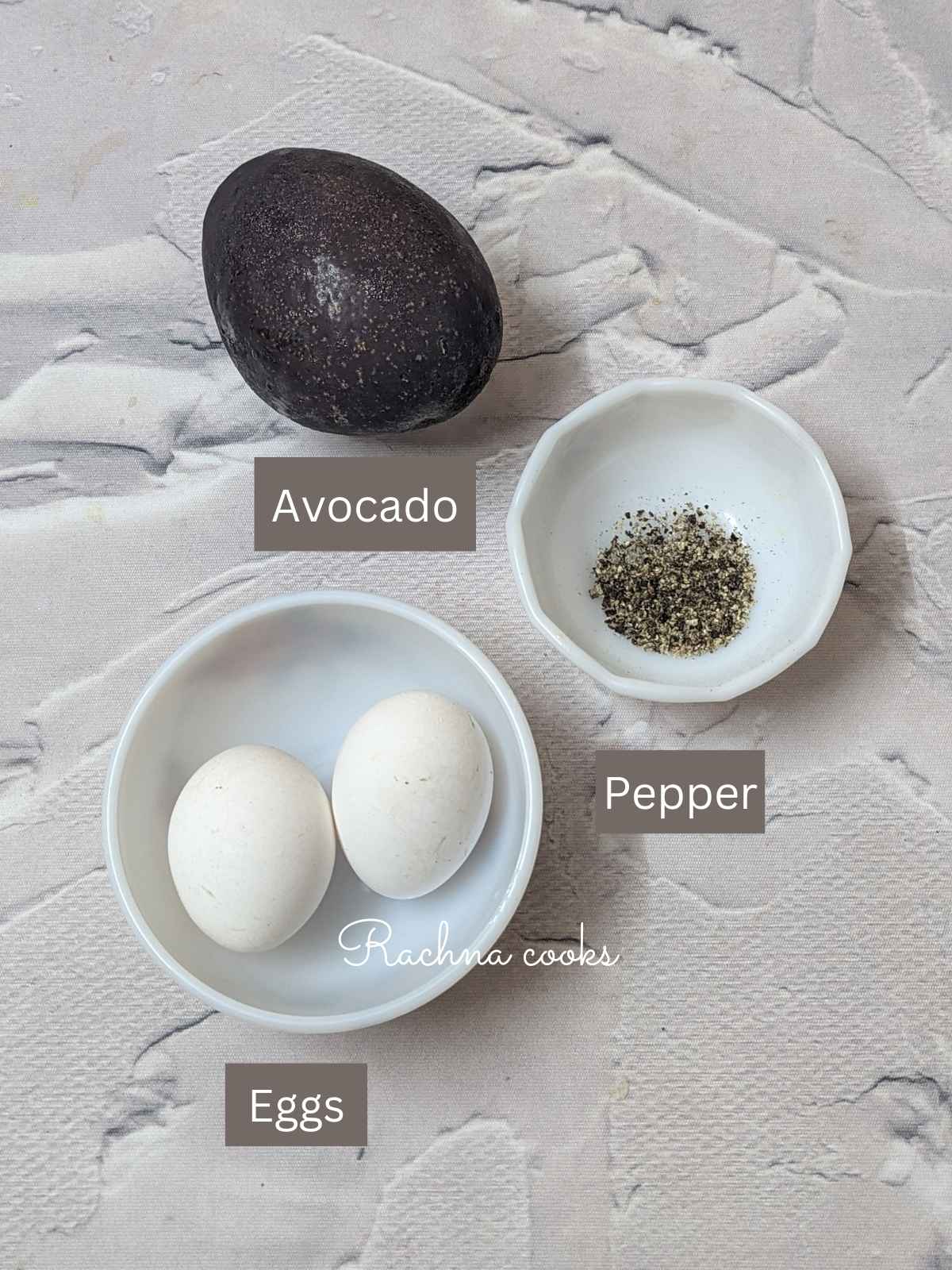 Ingredients for making avocado egg: 2 eggs, avocado and seasoning
