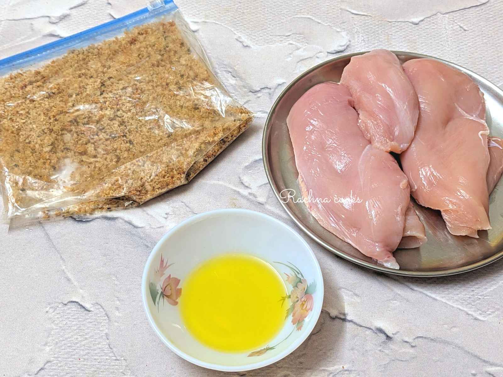 ingredients for making shake and bake chicken: chicken breasts, shake and bake and olive oil.
