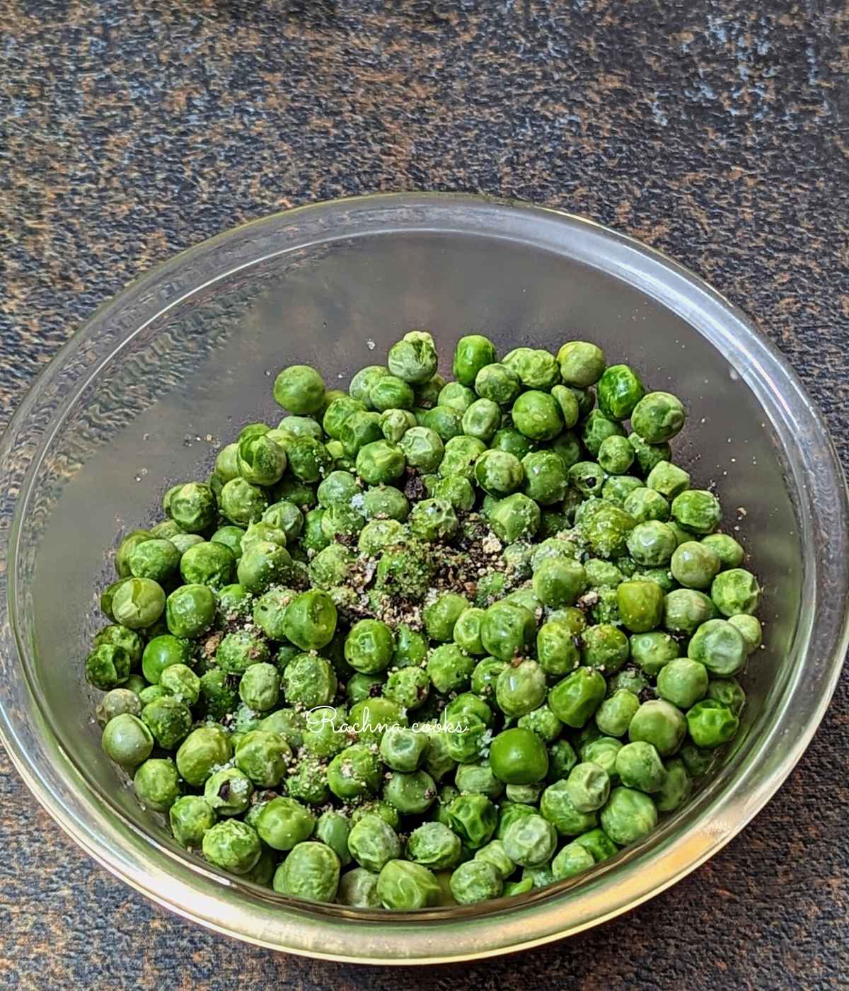 thawed peas tossed with salt, pepper and olive oil.