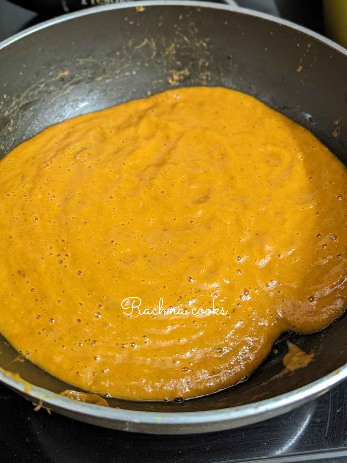 Blended curry base in a kadhai.